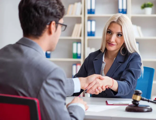 Lawyer discussing legal case with client