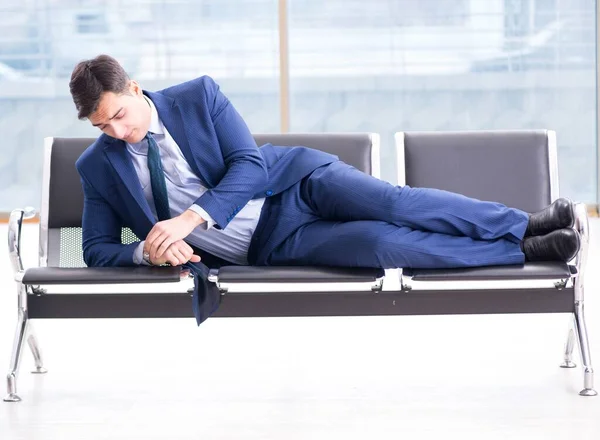 Businessman waiting at the airport for his plane in business cla Stock Photo