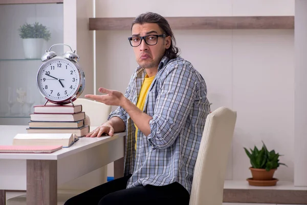 Young male student preparing for exam at home — Stock Photo, Image