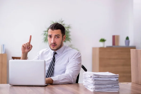 Young disabled employee suffering at workplace