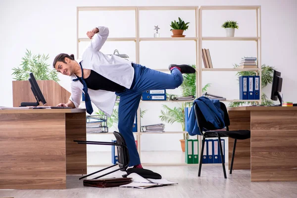 Young male employee businessman at workplace — Stock Photo, Image