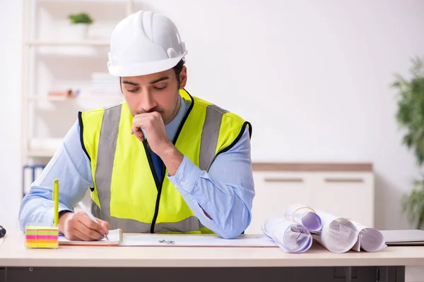 Young male architect working in the office — Stock Photo, Image