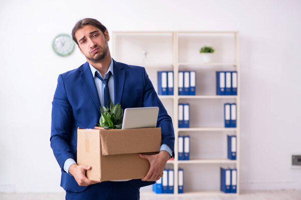 Young man being fired from his work