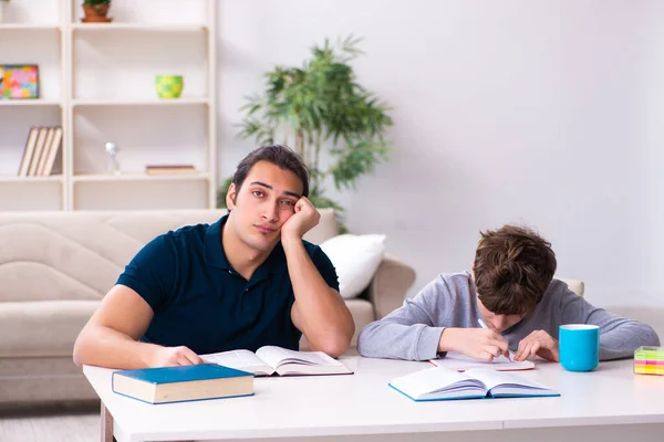 Father and son in exam preparation concept — Stock Photo, Image