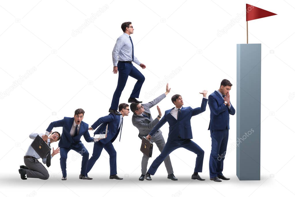 Career progression concept with businessman climbing stairs