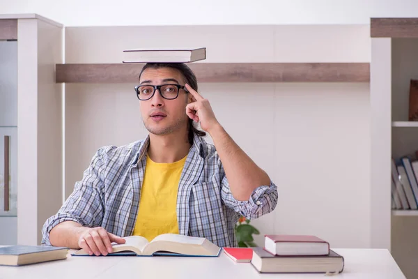 Young male student preparing for exam at home — Stock Photo, Image