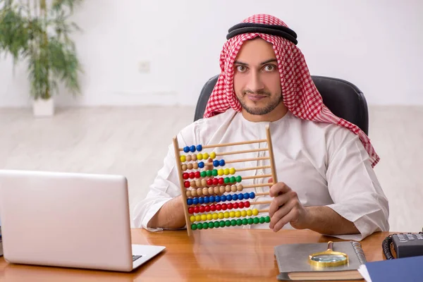 Young male arab employee working in the office — Stock Photo, Image