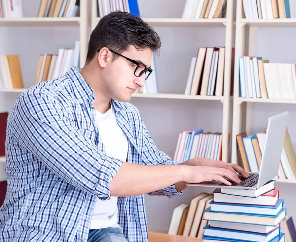Young student with books preparing for exams — Stock Photo, Image