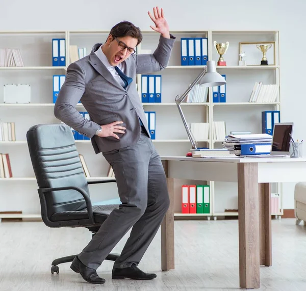 Businessman having fun taking a break in the office at work — Stock Photo, Image