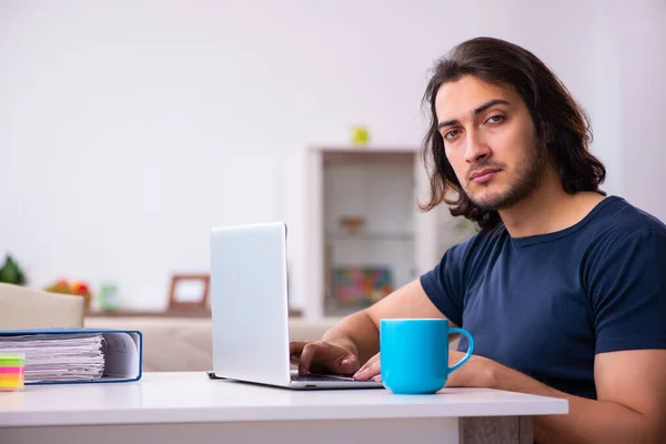 Young man employee working from house — Stock Photo, Image