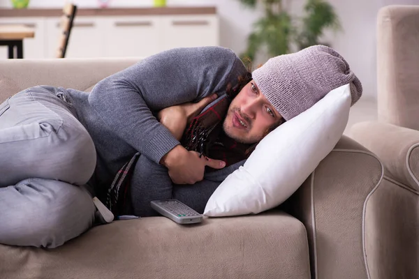 Young man suffering at home — Stock Photo, Image