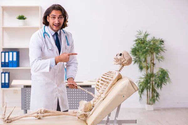 Crazy doctor examining dead patient