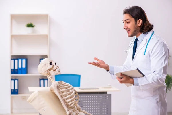 Crazy doctor examining dead patient