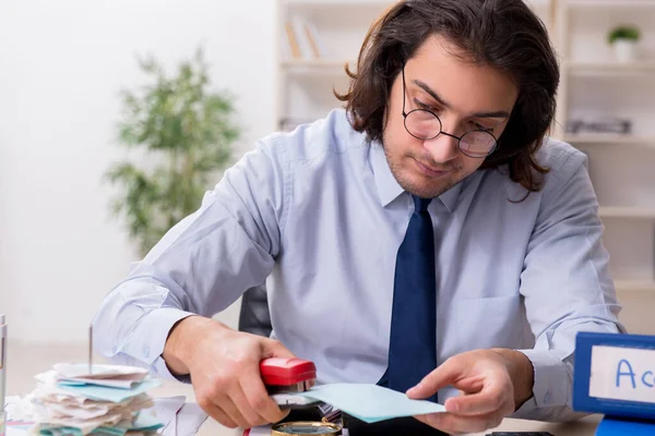 Young male financial manager in the office — Stock Photo, Image