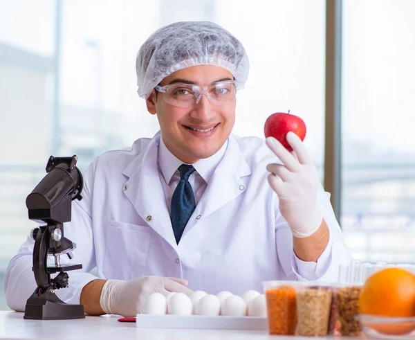 The nutrition expert testing food products in lab