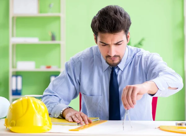 Young male architect working at the project — Stock Photo, Image