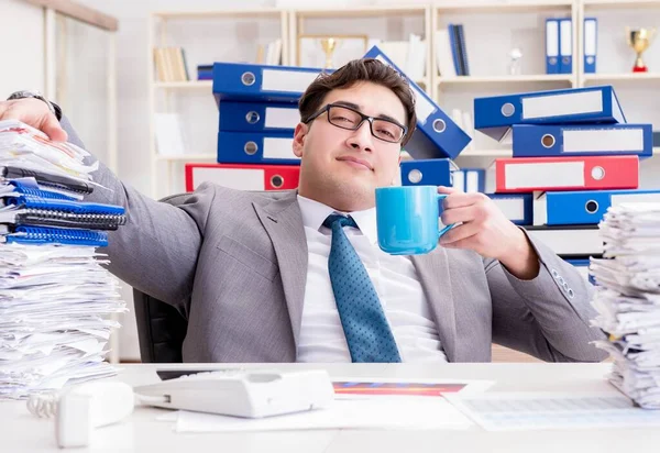 Businessman busy with much paperwork — Stock Photo, Image