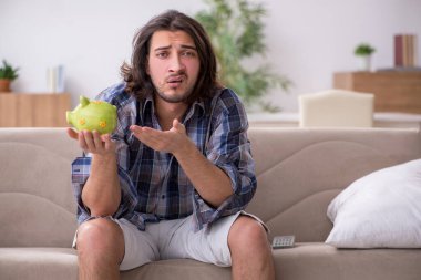 Yoksulluk konsepti içinde genç bir erkek öğrenci