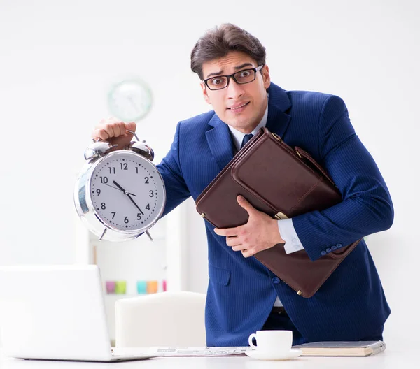 Businessman employee in urgency and deadline concept with alarm — Stock Photo, Image