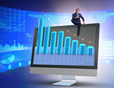 Ekonomik tahminde bulunan işadamı grafiklerle ilgili bir konsept