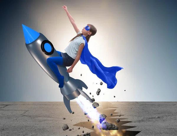 Superheld kind vliegt op raket — Stockfoto