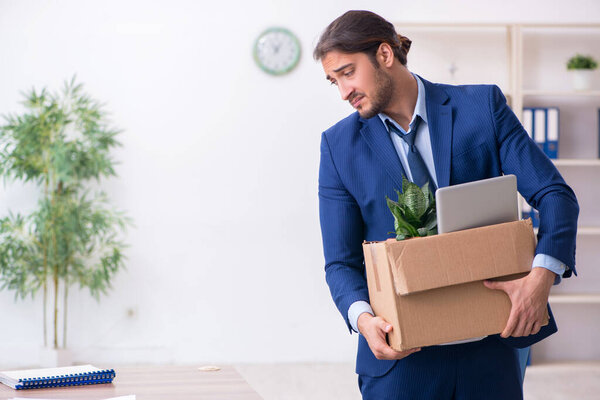 Young man being fired from his work