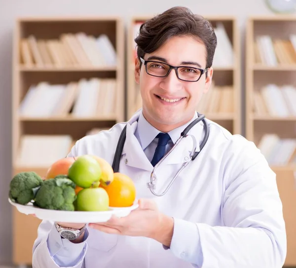 Scientist studying nutrition in various food — Stock Photo, Image