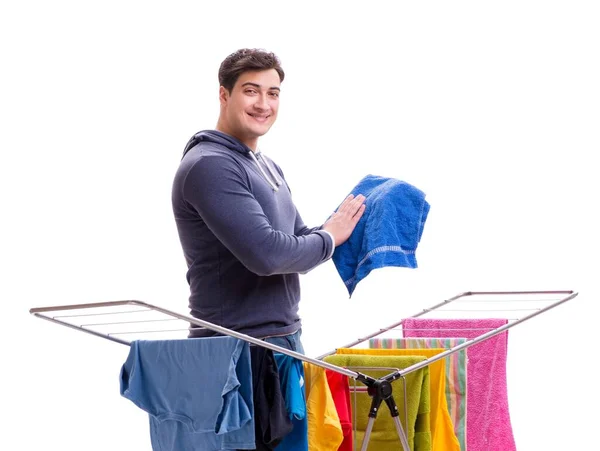 O marido homem fazendo lavanderia isolada em branco — Fotografia de Stock
