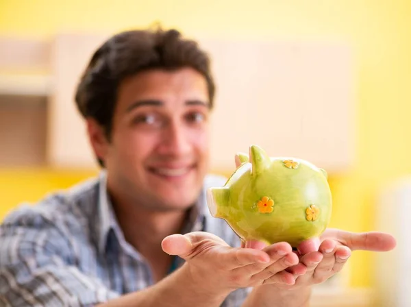 Young man husband in budget planning concept — Stock Photo, Image