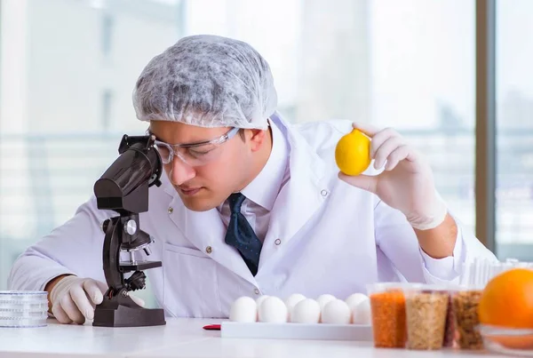 Nutrition expert testing food products in lab