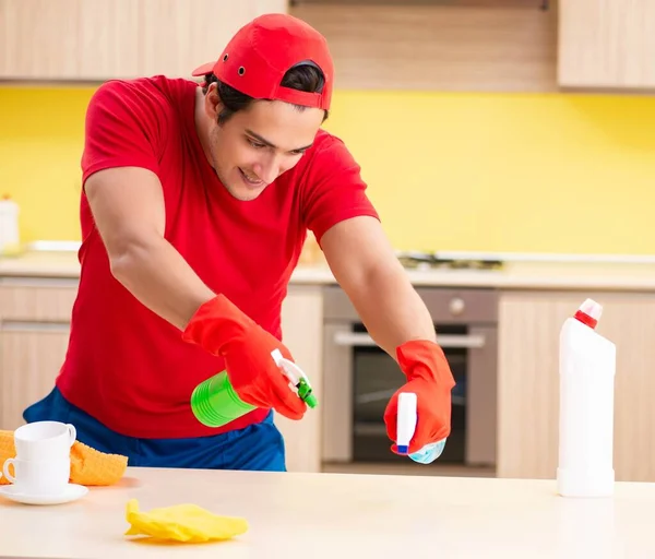 Cleaning professional contractors working at kitchen