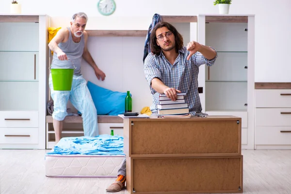 Young son student and dad alcoholic — Stock Photo, Image