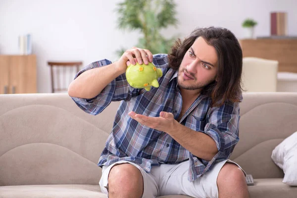 Jeune étudiant masculin dans le concept de pauvreté — Photo