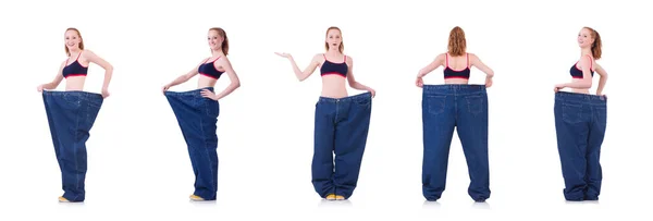 Donna con grandi jeans nel concetto di dieta — Foto Stock