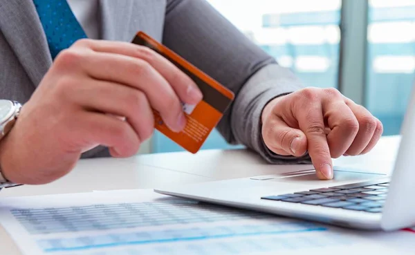 Male businessman doing online shopping with credit card — Stock Photo, Image