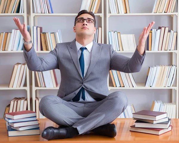 Businessman student in lotus position concentrating meditating — Stock Photo, Image