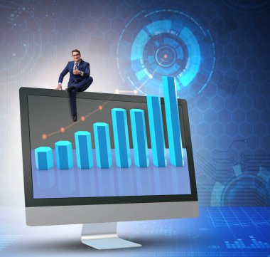 Grafiklerle ekonomi tahmini konseptinde iş adamı