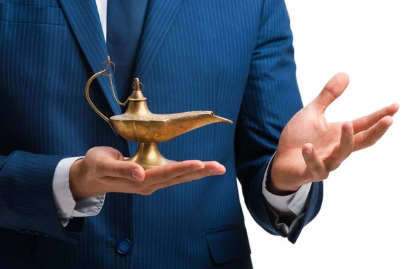 Businessman with magic lamp isolated on white — Stock Photo, Image