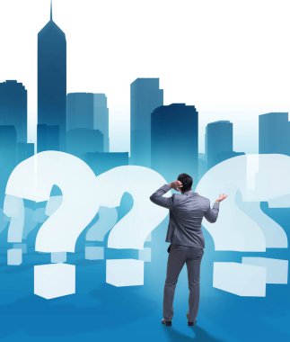 Soru işaretleriyle belirsizlik konseptinde iş adamı