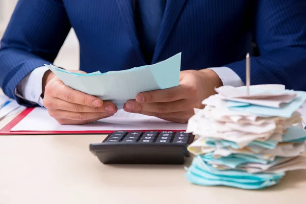 Young male financial manager in the office — Stock Photo, Image