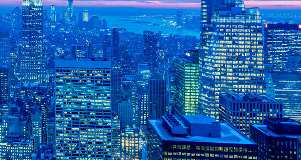 The view of new york manhattan during sunset hours