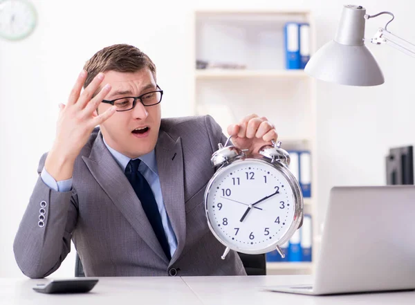 Businessman employee in urgency and deadline concept with alarm — Stock Photo, Image