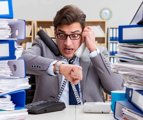 Busy businessman under stress due to excessive work — Stock Photo, Image