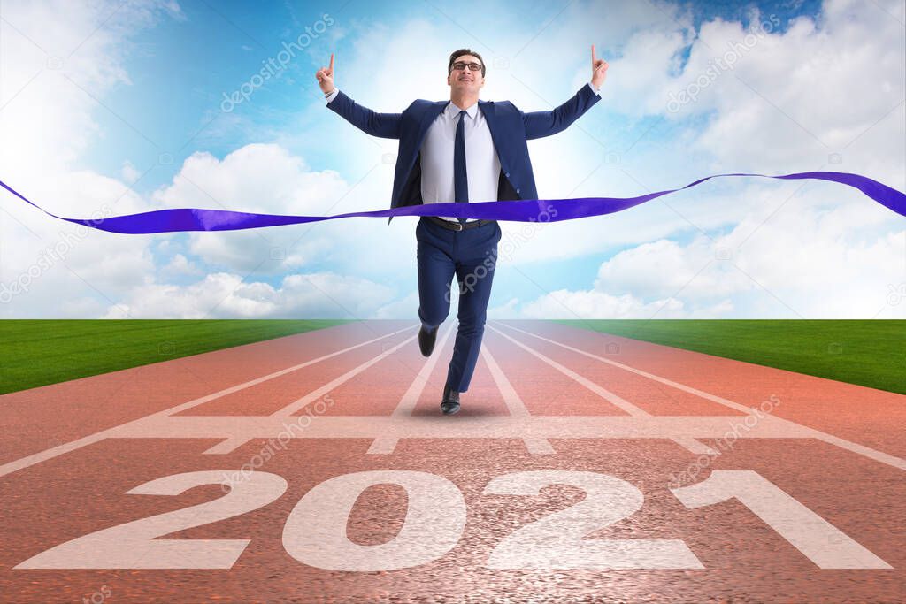 Businessman on finish line to year 2021