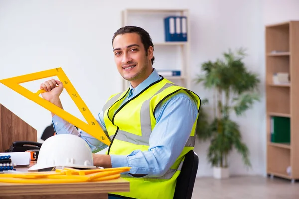 Young male architect working in the office — Stock Photo, Image