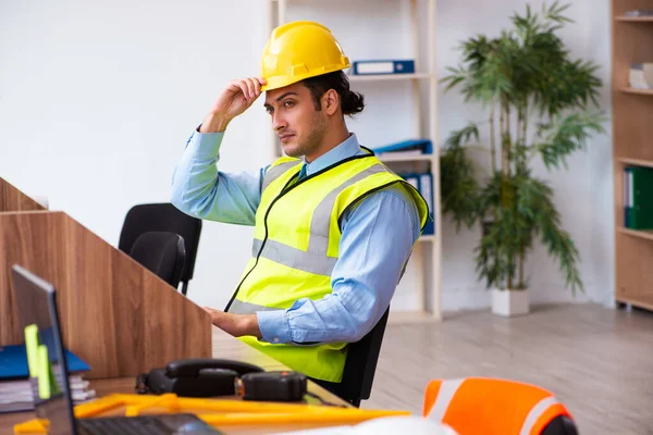 Young male architect working in the office — Stock Photo, Image