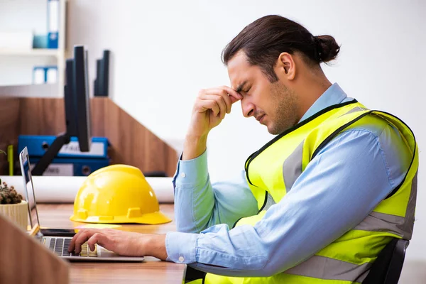 Young male architect working in the office — Stock Photo, Image