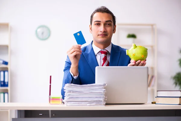 Young male employee working in the office — Stock Photo, Image