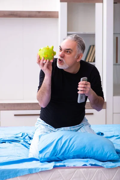 Unhappy old man in retirement concept — Stock Photo, Image