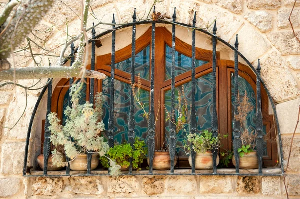 Windows in stone wall of Jaffa . Israel